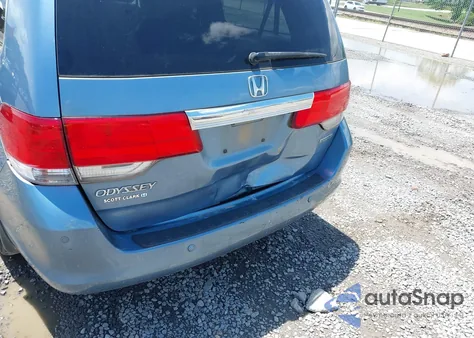 2010 Honda Odyssey Touring z USA, uszkodzony, nr VIN 5FNRL3H93AB058240